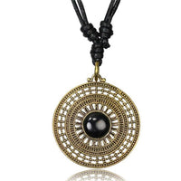 Load image into Gallery viewer, Kette Brass Baumwolle schwarz Anhänger Muster antik golden
