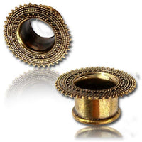 Load image into Gallery viewer, Two Brass Tunnel Punkte Afghan Style antique Finish gold plugs, nickelfree and featuring decorative dotted edges, are displayed on a white background with a slight reflection.
