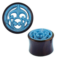 Load image into Gallery viewer, Two Tunnel Sonoholz Resin Türkis Inlay Spiralbögen ear plugs are shown: one front view highlights the ornate blue spiral pattern with dark brown sides, the other is angled to display the elegant design details.
