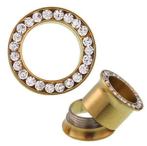 A pair of Glitzer Tunnel golden Kristall Inlay Edelstahl Plugs: one lies flat showing its sparkling clear rhinestone edge, while the other is partially unscrewed to reveal the threaded Chirurgenstahl Piercing Expander section.