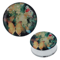 Cargar imagen en el visor de la galería, A round compact mirror with a vibrant butterfly and bird design on a green-yellow background, inspired by the Plug Tunnel Schmetterlinge grün gelb Edelstahl Acryl Expander Piercing Chirurgenstahl.
