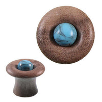 Load image into Gallery viewer, The Holz Tunnel hell gemasert Pilzform Plug features a wide, flat rim with an acrylic turquoise sphere at the center, shown from the front and side to highlight its Tribal Expander design and natural craftsmanship.
