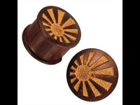 Load image into Gallery viewer, Holz dunkelbraun gemasert gold bemalt Lasergravur Strahlen Tunnel Tribal Expander
