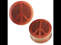 Load image into Gallery viewer, Holzplug dunkles braun handgeschnitzt große Lasergravur Peace Zeichen Tunnel Expander
