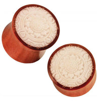Load image into Gallery viewer, Two natural brown Sawoholz plugs with carved bone inlay floral patterns, featuring intricate mandala designs. These stylish Expander Tunnels are perfect as unique Ohrdehner ear jewelry. Product: Sawoholz Plug natur braun Bone Inlay Blumenmuster geschnitzt.
