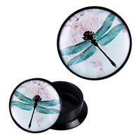 Load image into Gallery viewer, The Schraub Plug Acryl Libelle Blüten türkis rosa Piercing Ohrschmuck is a round black plug with a turquoise dragonfly and pink floral design, shown open to display the matching motif on both pieces.
