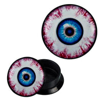Load image into Gallery viewer, The Schraub Plug Acryl Auge Augapfel blau Piercing Ohrschmuck is a black round container with lid, both featuring a realistic blue eye with red veins design on white. The open container shows its interior.
