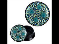 Load image into Gallery viewer, The Schraub Plug Acryl Illusionsmuster Kreise Punkte Piercing Ohrschmuck features a round plug with lid, both displaying vivid blue, yellow, and black spiral illusions on a black base, set against a white background with bold black side borders.
