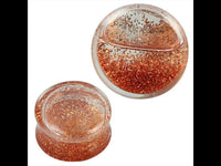 Load image into Gallery viewer, These Plug Acryl transparent Flüssigkeit Glitzer orange Piercing Ohrschmuck feature two round, clear acrylic plugs with shimmering orange glitter suspended in liquid, perfect as decorative jewelry for stretched piercings.
