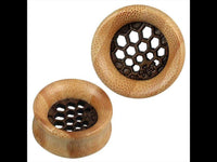 Load image into Gallery viewer, The Holz Tunnel Plug hell gemasert dunkles Inlay Waben Muster Tribal Piercing features a round wood design with honeycomb-shaped cutouts and a dark inlay, creating a bold plug look perfect for Tribal-style Ohr Tunnels.
