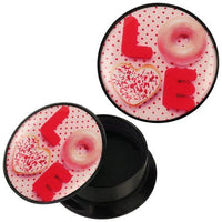 Load image into Gallery viewer, A round black Schraub Plug Acryl rosa LOVE Donut Herz Keks Punkte Piercing Ohrschmuck features a lid with cookies and candy spelling LOVE on a pink polka dot background, with a pink donut O, heart-shaped cookie V, and red L and E candies.
