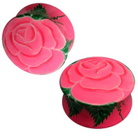 Load image into Gallery viewer, Two pink Holz Plug Rose Blume with green leaves, shown from different angles to highlight the floral design of these unique Teakholz Ohrschmuck Tunnel Ohrstecker Ohrringe Expander.

