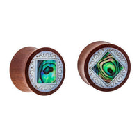 Load image into Gallery viewer, The Organic Sabaholz Plug features a Paua Abalone Perlmutt inlay framed in a square shape, blending natural elegance with tribal style.
