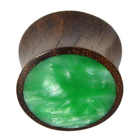 Load image into Gallery viewer, The Holz Plug Sonoholz grün schillernd Resin Inlay double flared is a round wooden plug with a green, shimmery marble-like resin inlay on one end, shown against a white background.
