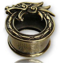 Load image into Gallery viewer, A brass tunnel ring in antique gold, inspired by Midgard Viking Weltenschlange, with dragon head design and scale patterns around the band.
