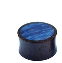 Load image into Gallery viewer, A round, dark Holz Plug Sonoholz with a slightly flared shape and a polished top featuring a shimmering blue Resin Inlay. The background is plain white.
