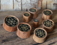 Load image into Gallery viewer, Olivenholz Horn Inlay Flesh Plug Blume des Lebens
