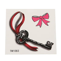 Cargar imagen en el visor de la galería, Klebetattoo temporär Schlüssel antik silbern Schleife comic pink 1 Bogen
