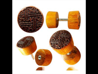 Load image into Gallery viewer, Fake Plug Blutholz Symbol Piercing Edelstahl Holz rot braun Om Blume des Lebens
