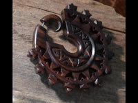 Load image into Gallery viewer, Fake Piercing Zackenrad Holz Edelstahl handgeschnitzt groß dunkelbraun Dehner
