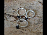 Load image into Gallery viewer, Piercing Ring 925 Silber Labret Tragus 1.2mm Onyx
