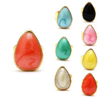 Cargar imagen en el visor de la galería, Eight colorful Brass Ohrstecker Stern earrings in coral, blue, black, pink, green, yellow, white, and light yellow are displayed in a grid, with the coral earring shown larger. These 12 mm Edelstahl earrings are unisex and nickelfrei for sensitive skin.
