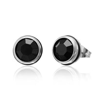 Load image into Gallery viewer, The CHICNET Brass Ohrstecker silber features 10mm round, faceted black Glaskristall stones set in hypoallergenic, nickel-free silver-toned bezels, shown on a white background with a subtle reflection beneath them.
