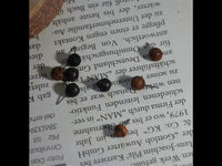 Load image into Gallery viewer, Gewindelose Piercing Enden 0.45mm Holz braun schwarz
