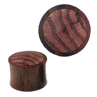 Load image into Gallery viewer, Two round Zebraholz ear plugs with a striped inlay and smooth finish, showcased upright and flat. These Tribal Holz Plug Sonoholz Zebraholz Inlay gestreift Tunnel Expander Ohrplugs feature a dark base and lighter wavy grain top.
