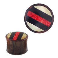 Load image into Gallery viewer, The Holz Plug Tamarindenholz Resin Perlmutt Koralle Streifen Tunnel Tribal Expander features a round face with a diagonal red stripe between black stripes on a cream background, shown from both front and angled side views.
