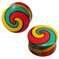 Load image into Gallery viewer, Two glossy Holz Plug bemalt Spirale grün rot gelb Tribal Tunnel Unisex Ohrschmuck Teakholz Ohrstecker, each with a red, green, and yellow spiral outlined in black, are displayed at different angles on a white background.
