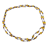 Load image into Gallery viewer, Baumwollkette schwarz Kette gewachst Baumwolle Glasperlen schwarz rot gelb handgefädelt 115 cm
