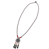 Load image into Gallery viewer, Kette 84 cm Brassanhänger Blume Herzen Perlen 10 cm grün rot schwarz Kordel
