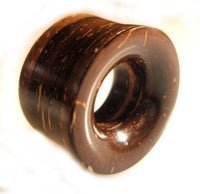 Load image into Gallery viewer, The Kokosnussholz Tunnel Scheiben is a dark brown, hand-carved Tribal Holztunnel Plug Expander with a smooth finish and natural wood grain—perfect as a unique body piercing accessory.
