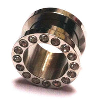 Load image into Gallery viewer, The Metall Tunnel Chirurgenstahl Strass Kristall Inlay Unisex Plug is a silbergrau expander made from stainless steel, featuring a hollow center and a Glitzerstein design ring with clear crystals, shown on a white background.
