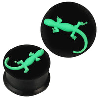 Cargar imagen en el visor de la galería, Der Silikon Plug weich schwarz neon grün Gekko Piercing Ohrschmuck zeigt einen leuchtend grünen Gekko auf schwarzem Plug. Das Bild illustriert den Plug aus der Seiten- und Draufsicht.
