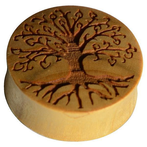 The Krokodil Holz Plug Baum des Lebens hell double flared is a round earplug engraved with a detailed tree of life design, showcasing intricate branches and roots across its surface.