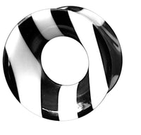 Load image into Gallery viewer, The Bone HornTunnel weiß schwarz gestreift double flared is a round organic piece with a central hole, crafted from bone and Büffelhorn, featuring bold black and white stripes reminiscent of a Tribal Tunnel on a white background.
