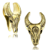 Load image into Gallery viewer, Saddle Plug Flesh Tunnel Büffel Schädel Messing gold
