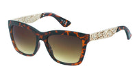 Load image into Gallery viewer, The Sonnenbrille Damen Glamour has getönte 400UV-Gläser, Cateye-Design, glitzernde Blumenornamente am Bügel und bietet stilvollen Schutz – Gläser sind oben dunkler und unten heller.
