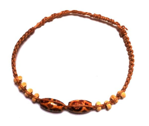 A braided orange-brown cotton and waxed unisex friendship bracelet with wooden beads, shown on a white background—ideal as a Freundschaftsarmband or unique Holzperlen Armband.