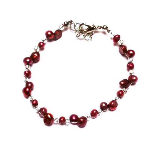 The Armband rot metallic Perlen Glasperlen Edelstahl Damen Glitzer Schmuck verstellbar features red metallic beads, clear glass spacers, a silver lobster clasp, and is shown on a white background.