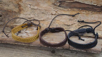 Load image into Gallery viewer, Lederarmband 10mm breit geflochten Baumwolle verstellbar
