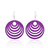 Load image into Gallery viewer, A pair of colorful, round 50 mm wooden earrings (Holzohrringe bunt) with semicircle designs and nickelfrei hooks, displayed against a white background.
