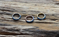 Cargar imagen en el visor de la galería, Klapp Segment Ring Piercing Edelstahl blau Opal unten

