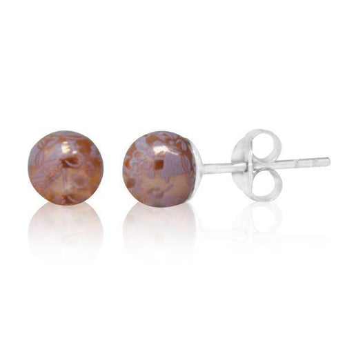 A pair of metallic pink pearl Perlenohrstecker featuring floral designs, set on 925er Silber studs for women, displayed against a white background.