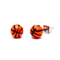 Load image into Gallery viewer, A pair of Ohrstecker Sport Ball rund 6 mm Acryl Unisex Ohrringe, designed like small basketballs in orange with black lines, made from nickelfrei Edelstahl, displayed on a white background.

