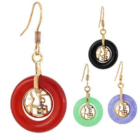 Cargar imagen en el visor de la galería, Four Brass Ohrringe Ohrhänger Damen with circular hoops in red, black, green, and purple, each with a gold hook and dangling Katzenauge rund cut-out charm.
