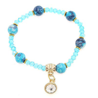 Cargar imagen en el visor de la galería, Armband Brass golden Zirkonia Charm Kristalle Perlen marmoriert blau verstellbar - chic-net.de
