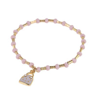 Load image into Gallery viewer, Armband Brass Steine goldfarben Perlen rosa Anhänger Handtasche - chic-net.de
